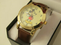 DISNEY MICKEY MOUSE MEN”S WATCH WITH MOLDED HANDS AND BROWN LEATHER BAND MK1448