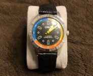 Vintage ORIS Men’s Hand wound Watch running  Silver case black orange blue dial