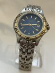 Embassy By Green Mens Watch Blue Dial Gold Tone Case Silver Metal Band With Date