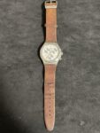 Swatch Men’s Watch Botillon Chronograph Silver Tone Dial Brown Strap YCS597